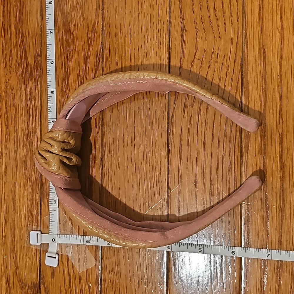 Cute, pink and faux snake skin material knot headband